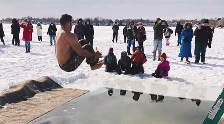 Man doing cannonball at Culver Winterfest in Culver, Indiana (photo courtesy of Culver Winterfest)