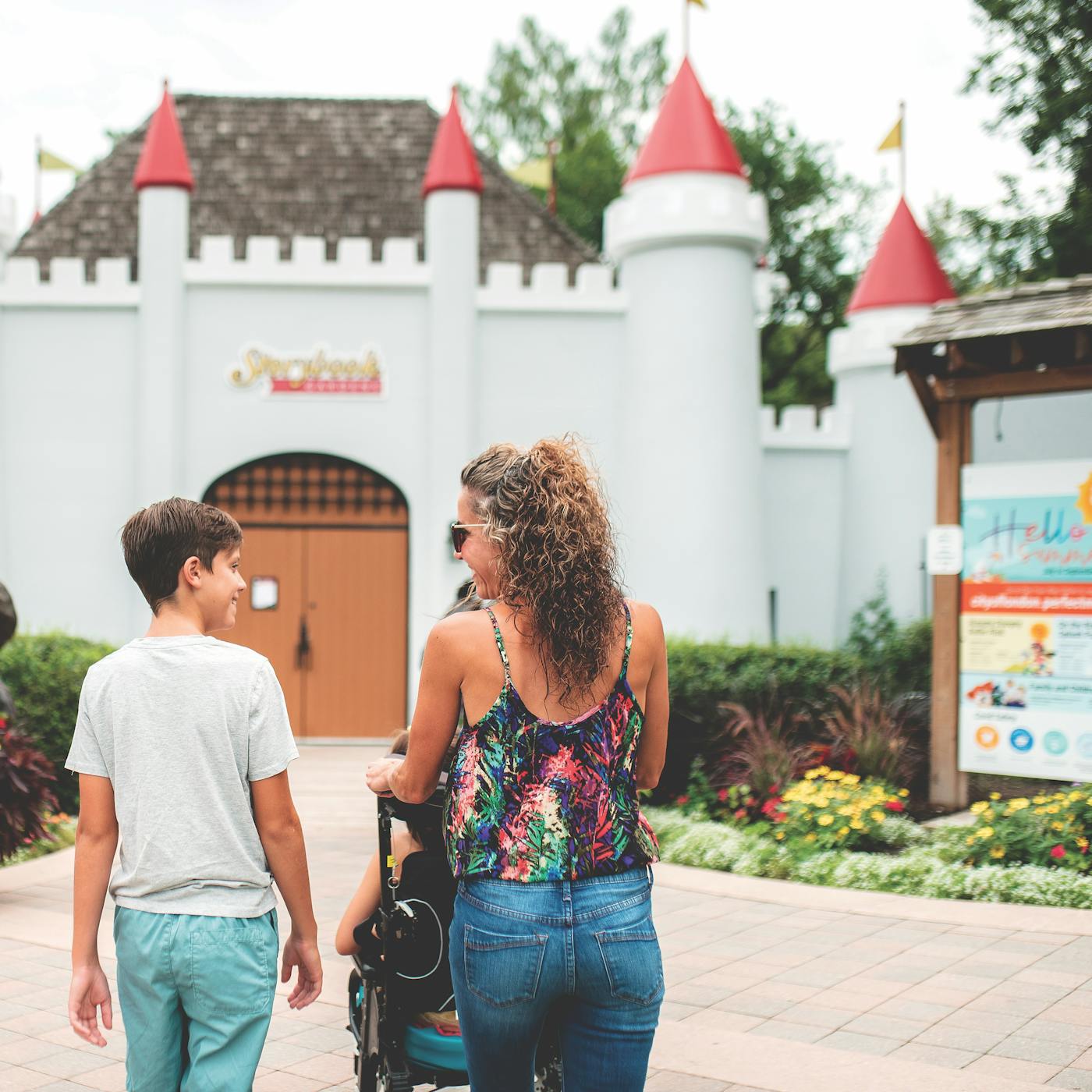Mother and kids entering castle at Storybook Gardens in London, Ontario (photo by Dudek Photography))