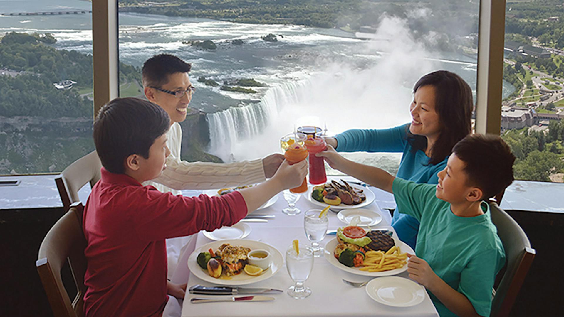 Family enjoying dinner at Skylon Tower's Revolving Dining Room in Niagara Falls, Ontario (photo courtesy of Skylon Tower)