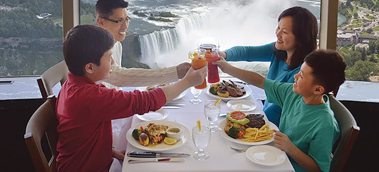 Family enjoying dinner at Skylon Tower's Revolving Dining Room in Niagara Falls, Ontario (photo courtesy of Skylon Tower)