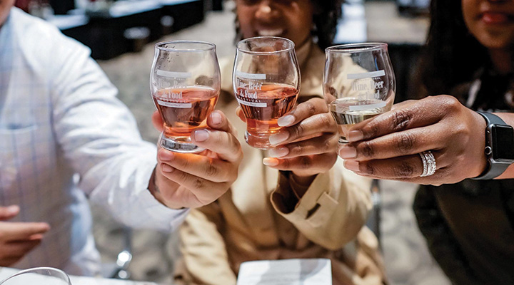 People cheers-ing at Grand Rapids International Wine, Beer and Food Festival