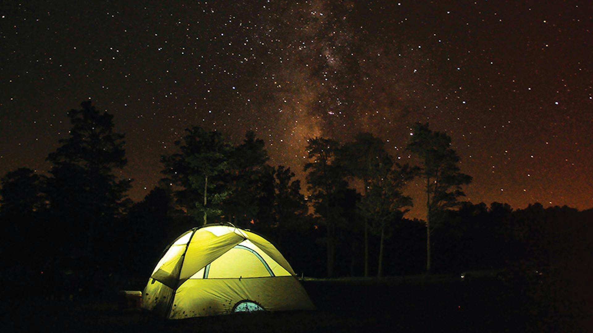 Illuminated tent at night in Cherry Springs State Park in Coudersport, Pennsylvania (photo by Pennsylvania Department of Conservation and Natural Resources)