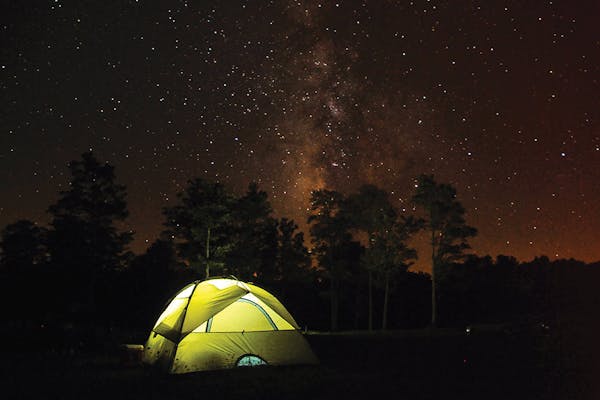 Illuminated tent at night in Cherry Springs State Park in Coudersport, Pennsylvania (photo by Pennsylvania Department of Conservation and Natural Resources)