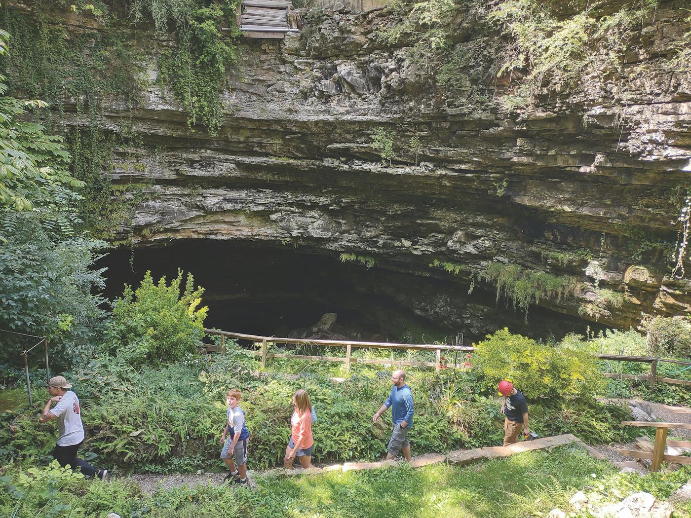People walking out of Hidden River Cave entrance in Horse Cave, Kentucky (photo courtesy of Hidden River Cave))
