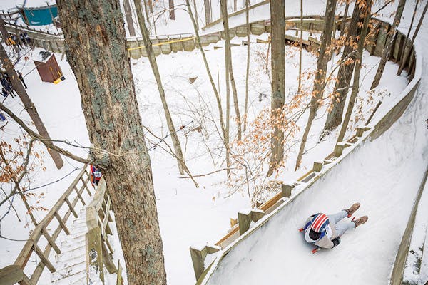 Person riding down luge at Muskegon Luge Adventure Sports Park in Muskegon, Michigan (photo by Adam Alexander Photography)
