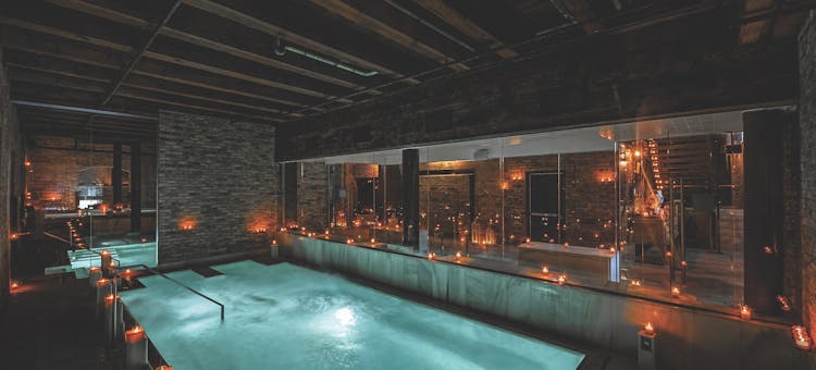 Candlelit Roman bath at Aire Ancient Baths in Chicago, Illinois (photo courtesy of Aire Ancient Baths)
